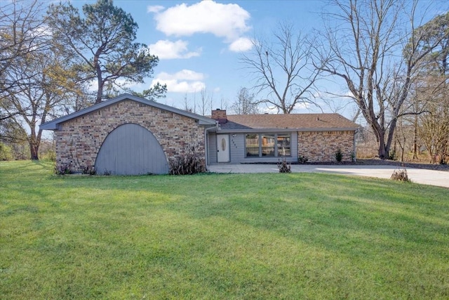 ranch-style house with a front lawn