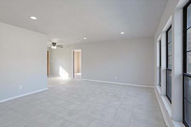 empty room featuring ceiling fan