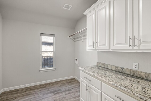 doorway to outside with a chandelier and crown molding