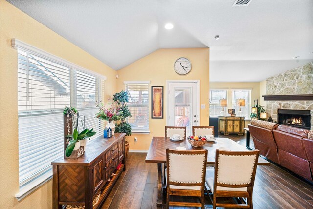 dining area featuring vaulted ceiling, ceiling fan, and sink