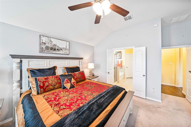 bathroom featuring tile patterned floors, vanity, plus walk in shower, and vaulted ceiling