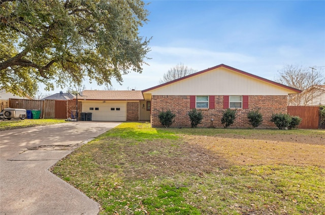 single story home with a garage and a front lawn