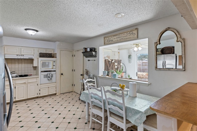 dining area featuring ceiling fan