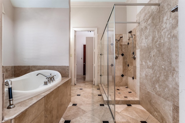 bathroom featuring separate shower and tub