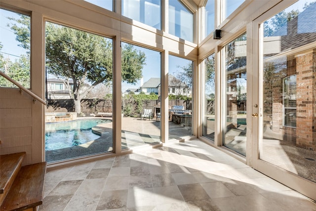 entryway with a towering ceiling