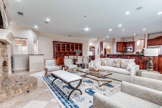 living room with ornamental molding