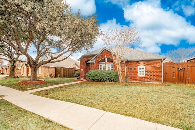 view of front of home with a front lawn