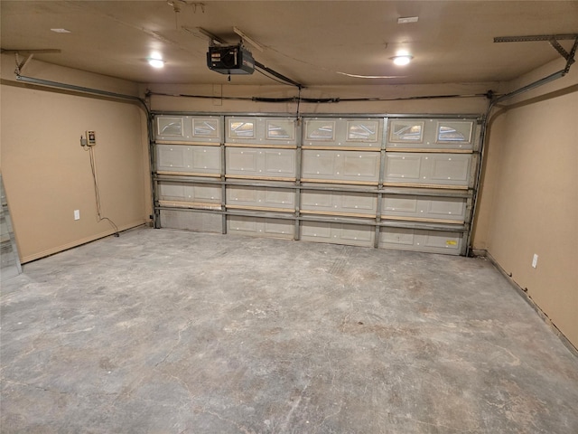 garage featuring a garage door opener