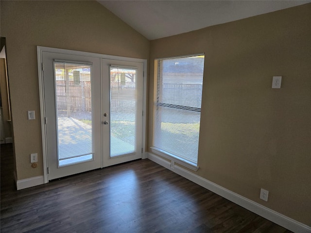 doorway featuring french doors, dark hardwood / wood-style floors, and lofted ceiling