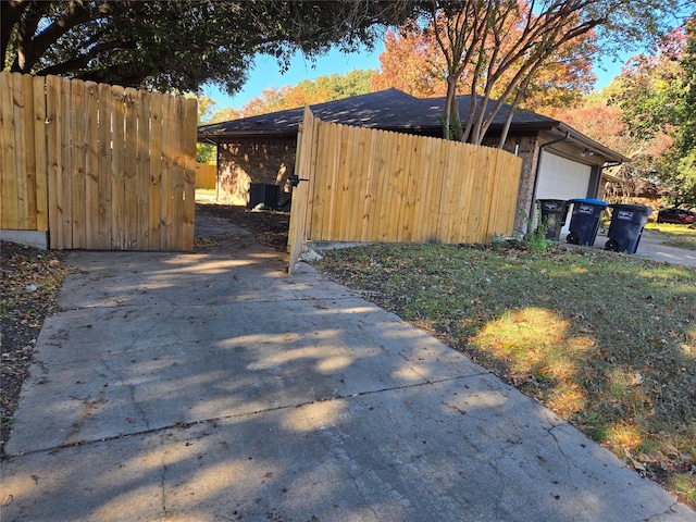 view of side of property featuring a garage