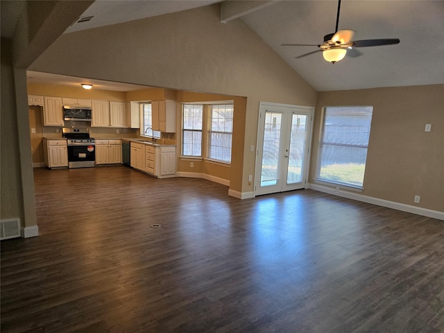 unfurnished living room featuring french doors, sink, dark hardwood / wood-style floors, ceiling fan, and beamed ceiling