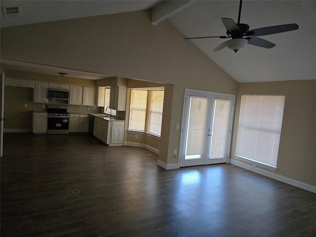 unfurnished living room with dark wood-type flooring, high vaulted ceiling, french doors, ceiling fan, and beam ceiling