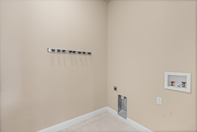 laundry area featuring hookup for a washing machine, hookup for an electric dryer, and light tile patterned flooring