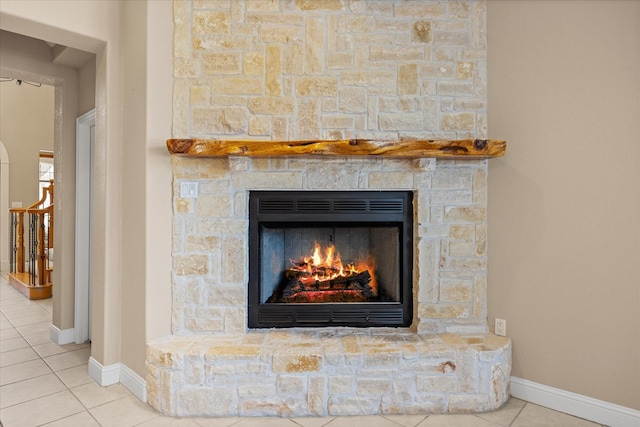 details featuring a stone fireplace