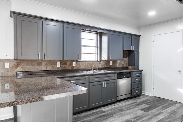 kitchen with gray cabinetry, sink, stainless steel dishwasher, ornamental molding, and kitchen peninsula