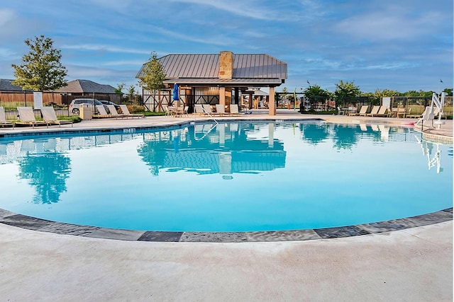 view of pool featuring a patio