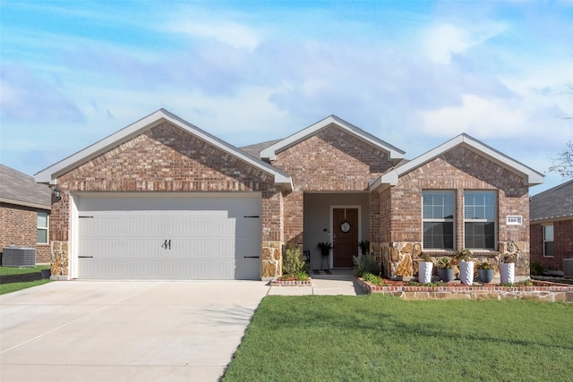 single story home featuring a garage, driveway, brick siding, central AC, and a front yard