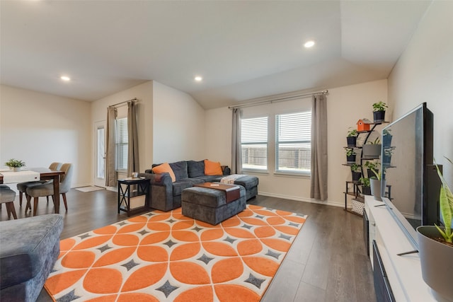 living area with lofted ceiling, baseboards, wood finished floors, and recessed lighting