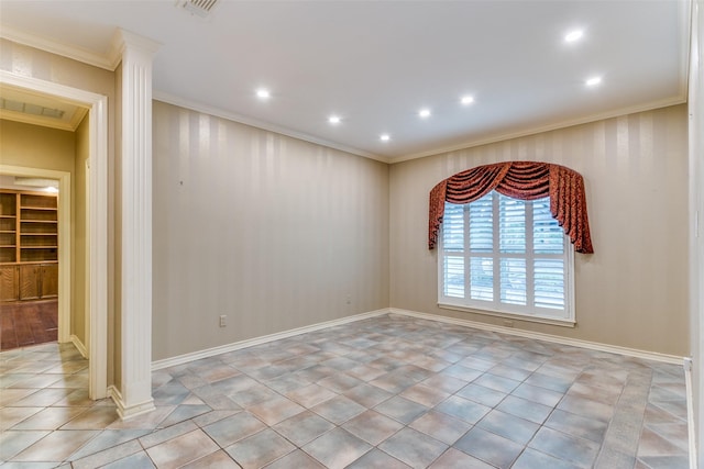 tiled spare room with ornamental molding and decorative columns