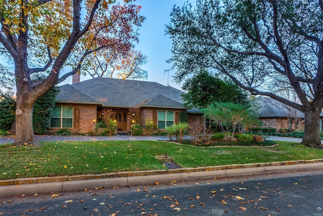 view of front of home with a front lawn