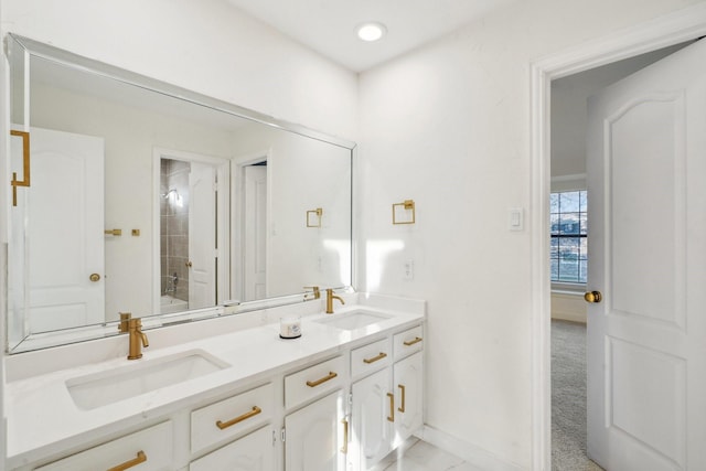 bathroom featuring bathtub / shower combination and vanity