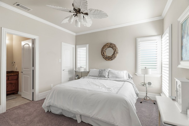 bedroom with ceiling fan, ornamental molding, light carpet, and multiple windows