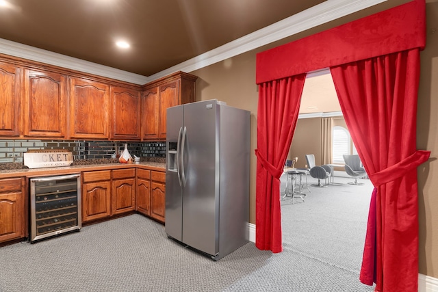 kitchen featuring wine cooler, stainless steel fridge with ice dispenser, crown molding, light colored carpet, and decorative backsplash