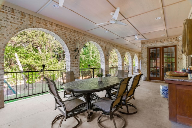 view of patio featuring ceiling fan and french doors