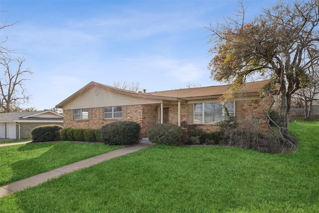 single story home with a front lawn