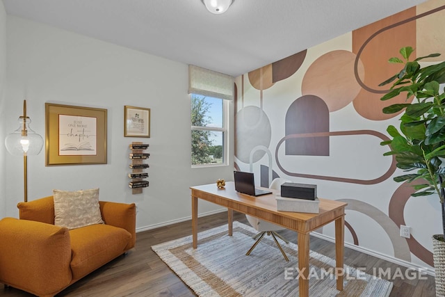 home office with hardwood / wood-style floors