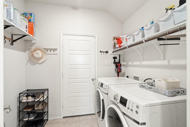 laundry room featuring light tile patterned flooring and independent washer and dryer