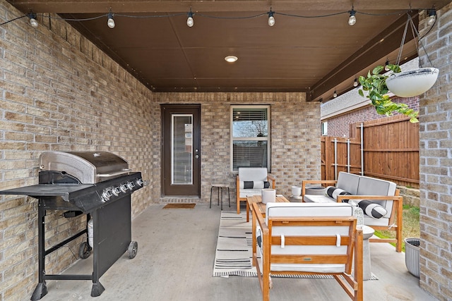 view of patio featuring area for grilling and an outdoor hangout area