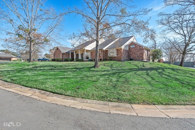 ranch-style house with a front yard