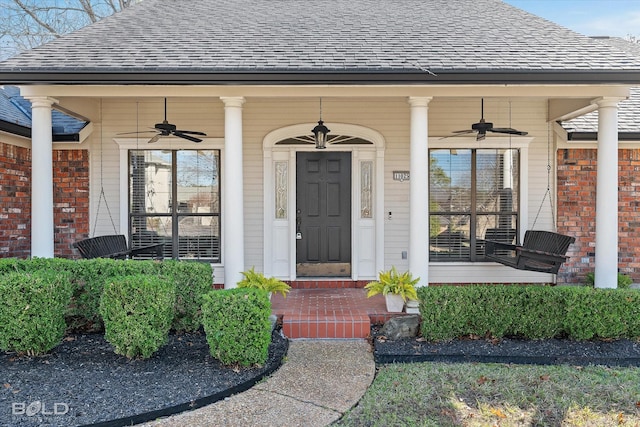 property entrance with a porch and ceiling fan