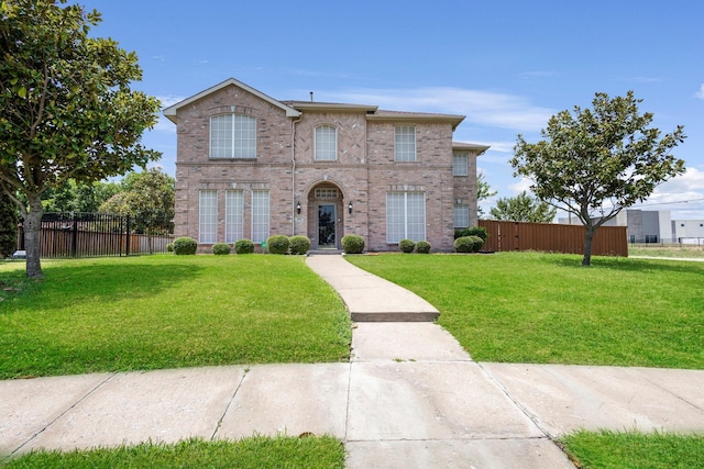 view of front of property featuring a front yard