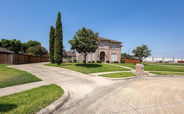 view of front facade featuring a front yard