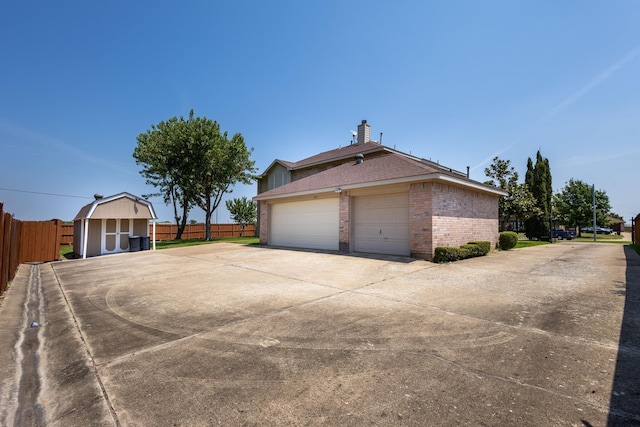 view of side of home with a garage