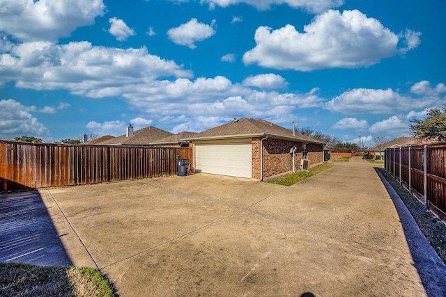 view of side of property featuring a garage