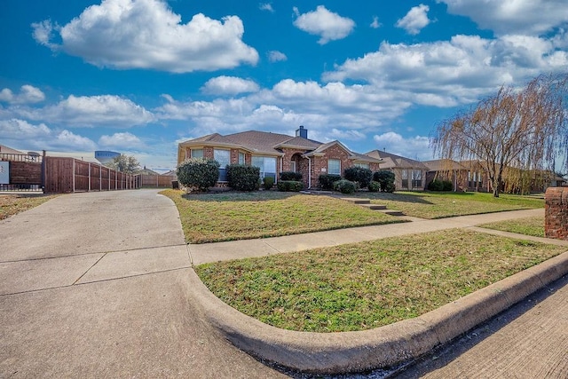 single story home with a front yard