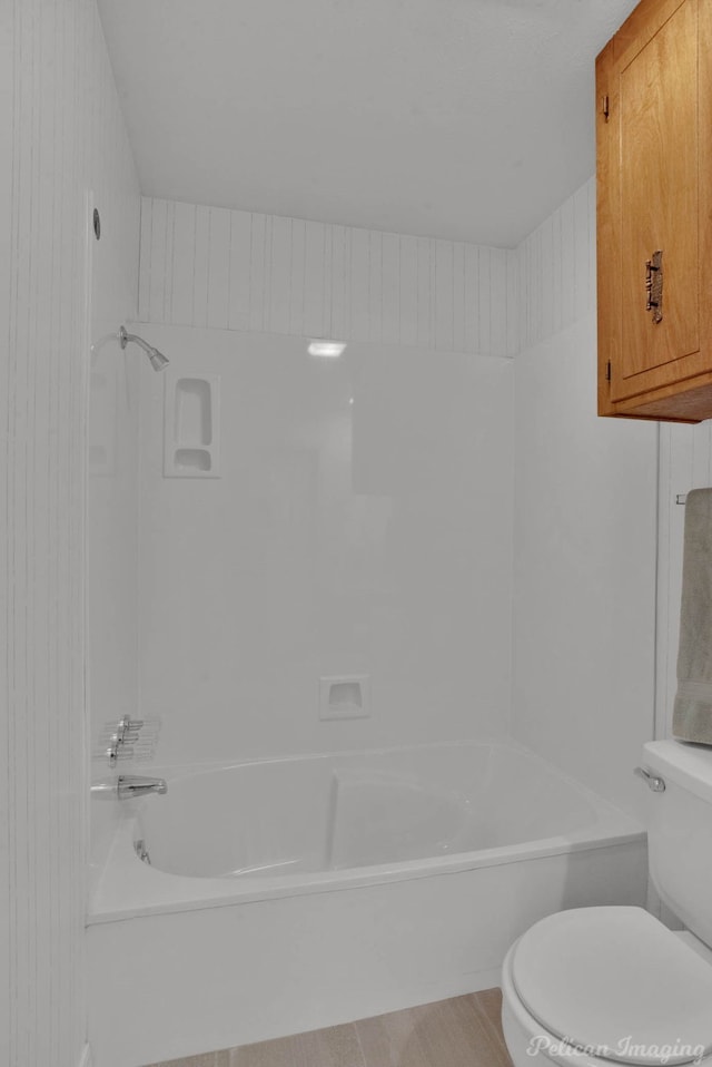 bathroom with shower / bathtub combination and toilet