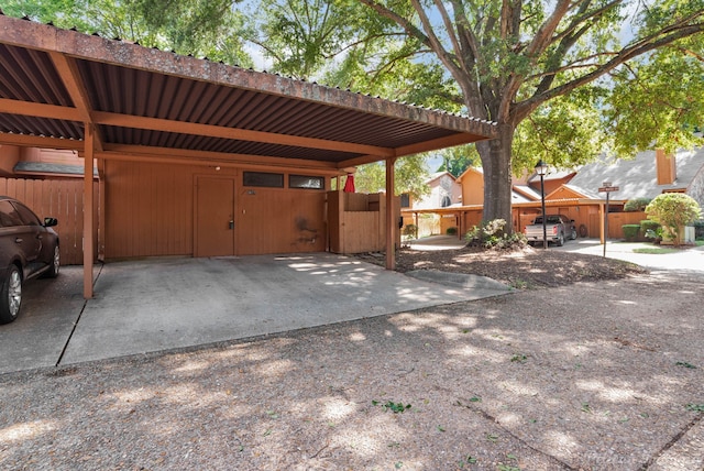 exterior space featuring a carport