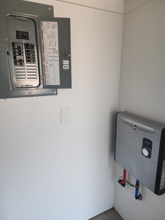 utilities with electric panel and water heater