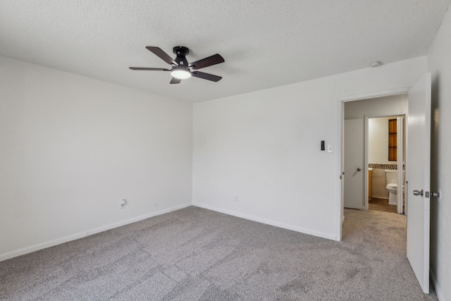 unfurnished room with light carpet, a textured ceiling, and ceiling fan