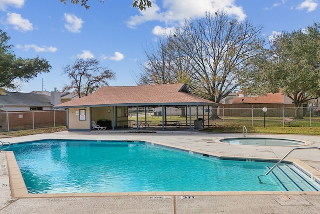 view of pool with a gazebo, a patio area, and a community hot tub