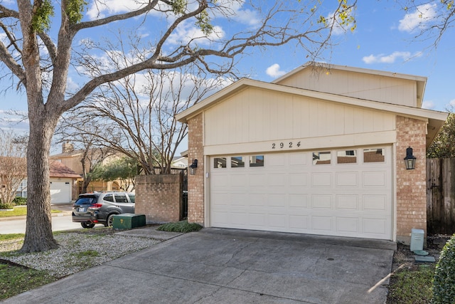 view of side of property featuring a garage