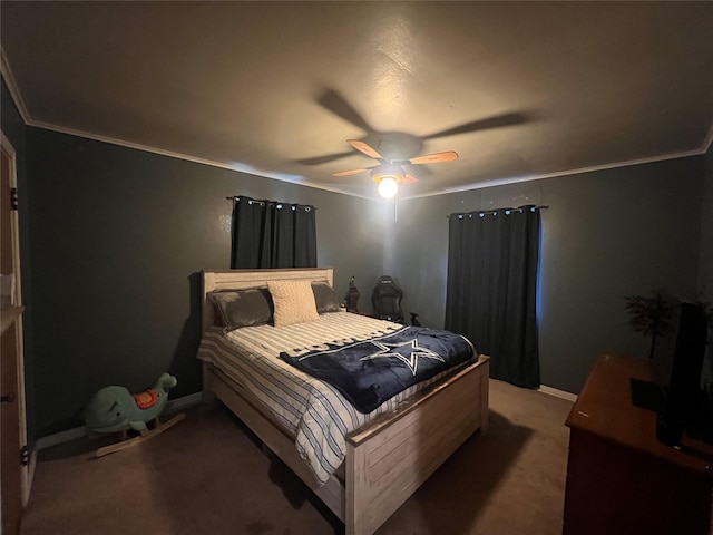 carpeted bedroom with ceiling fan and ornamental molding