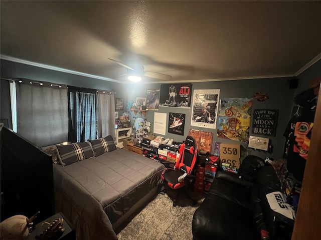 bedroom with ceiling fan, carpet flooring, and crown molding