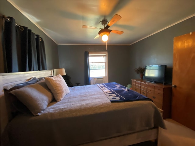 bedroom with ornamental molding and a ceiling fan