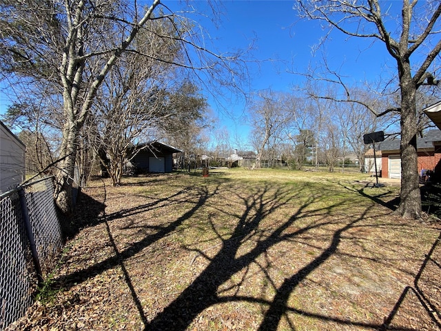 view of yard with fence