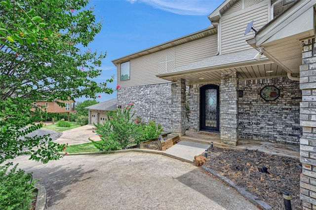 property entrance featuring a garage